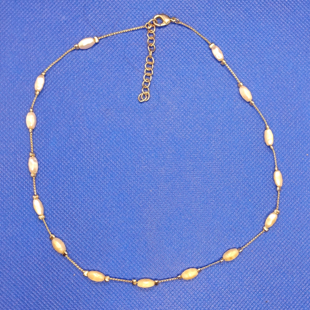 Elegant Gold and Cream Necklace